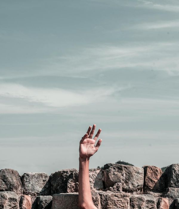 Silhouette of a person against a bright, clear sky, symbolizing mental clarity.